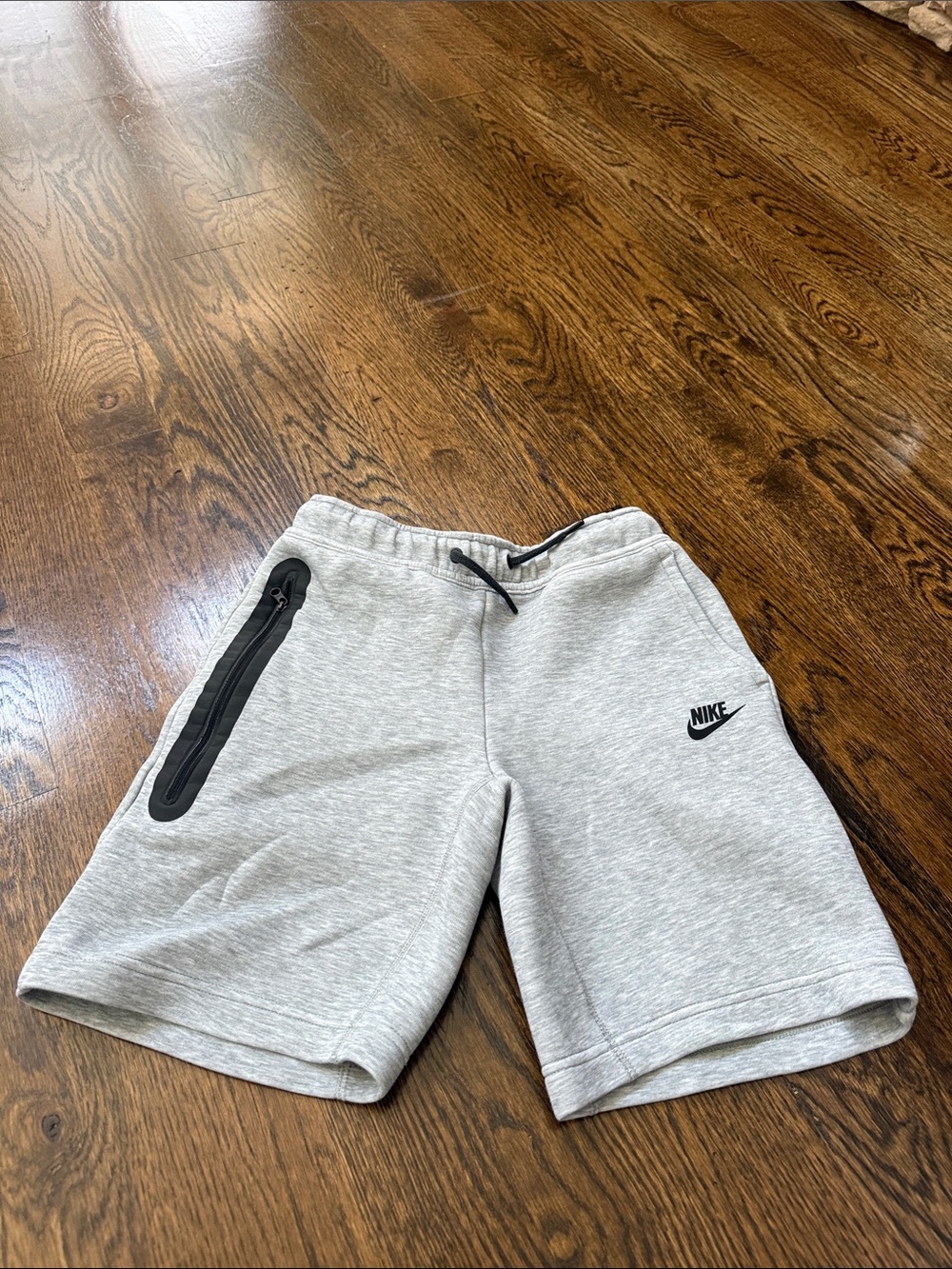Nike Light Grey Athletic Fleece Shorts with Black Zip Accent